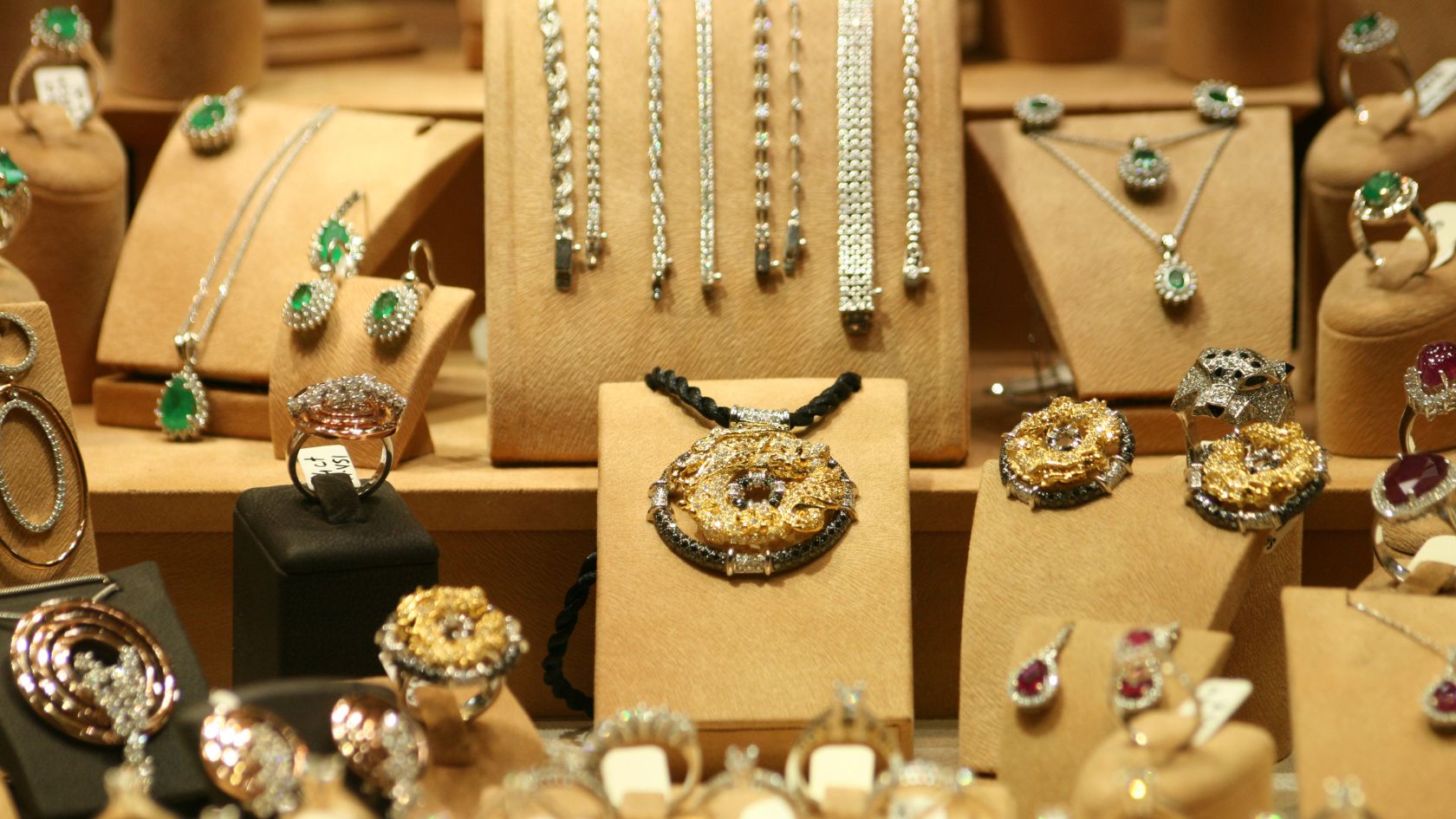 A bunch of jewelry is on display in a store