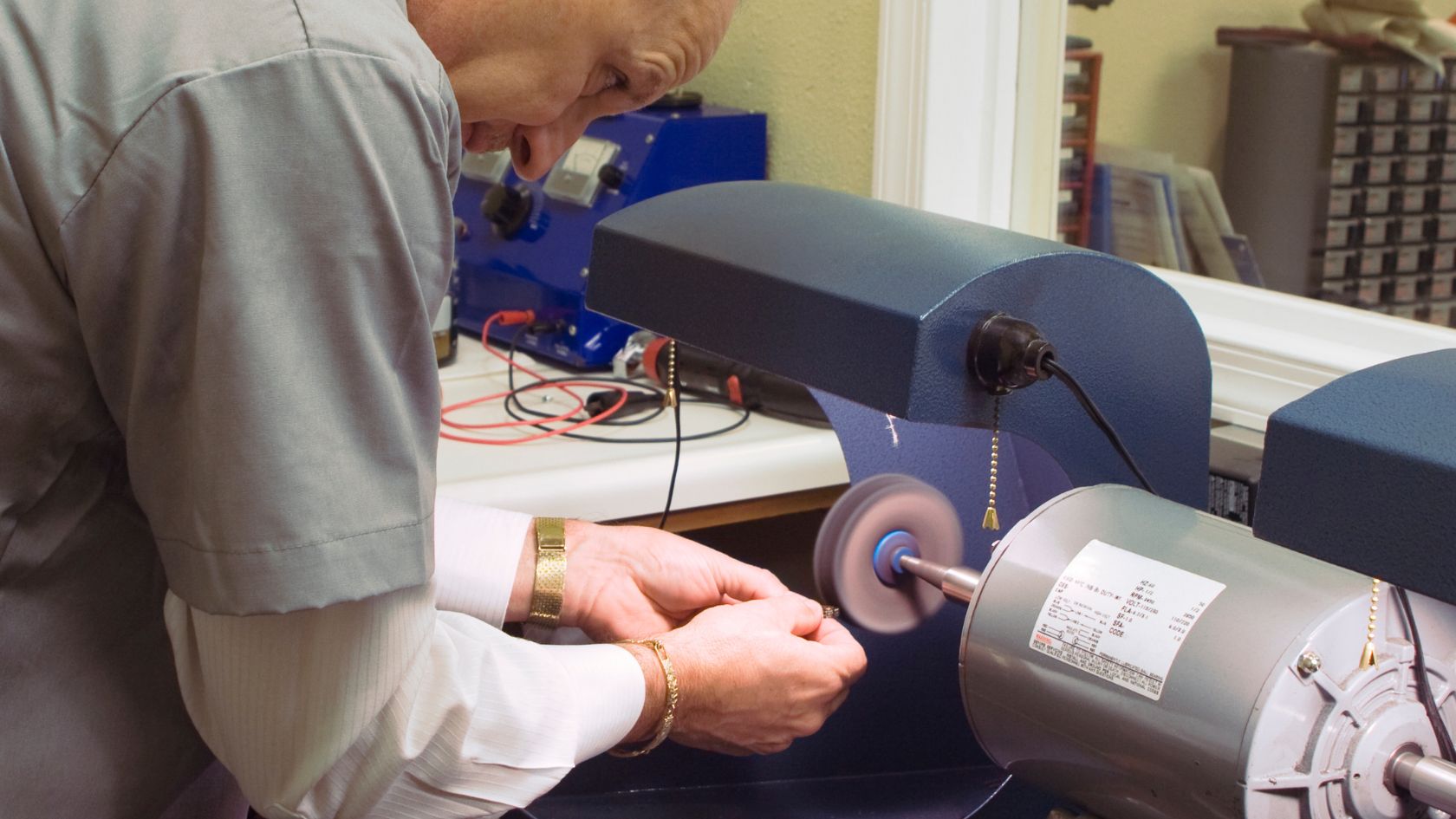 A man working on a machine in a factory