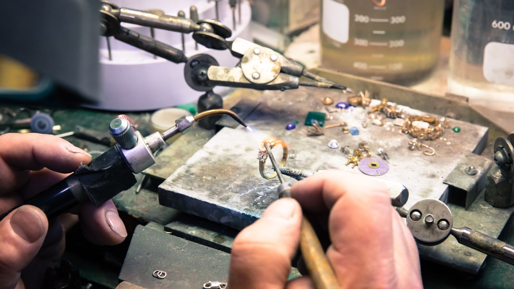 A man working on a machine with a wrench